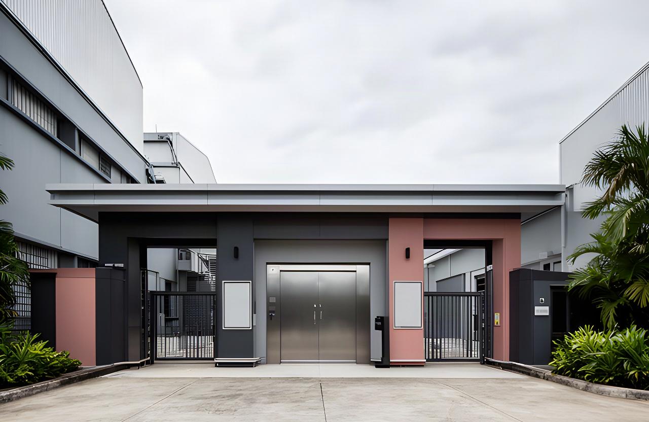 Siloso Road factory entrance with secure access doors and company signage